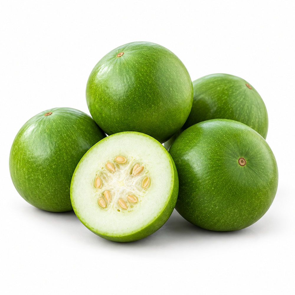 Desi Tinda Dark Green Apple Gourd with round deep-green tender fruits growing among healthy green leaves and spreading vines – summer vegetable seeds for kitchen gardens and grow bags Pakistan